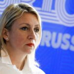 Le président russe Vladimir Poutine et la porte-parole du ministère russe des Affaires étrangères, Maria Zakharova